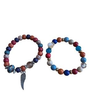 Set of 2 Multi Color Beaded Stretch Bracelets  Silver Wing Charm